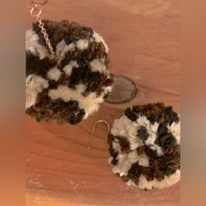 Leopard Pom-pom earrings.